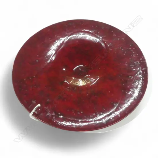 KEUM SUN LEE BURGUNDY WIDE FOOTED DISH, Dia.450mm, pitted surface spots in glaze, Dia.450mm