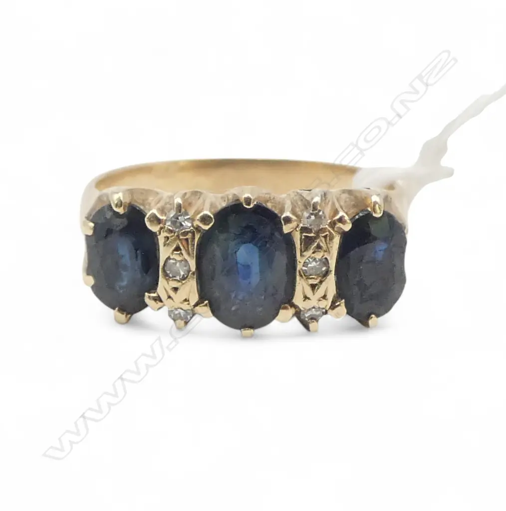 9CT Y/G SAPPHIRE AND DIAMOND RING 3.28gms two claws worn & sapphires showing wear SIZE N Image 1++