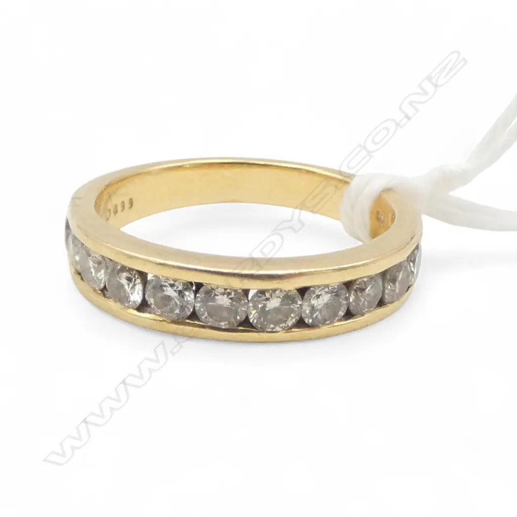18CT GOLD CHANNEL SET DIAMOND BAND( approx.1.00ct total DIA Weight) 4.97gms SIZE O1/2 Image 1++