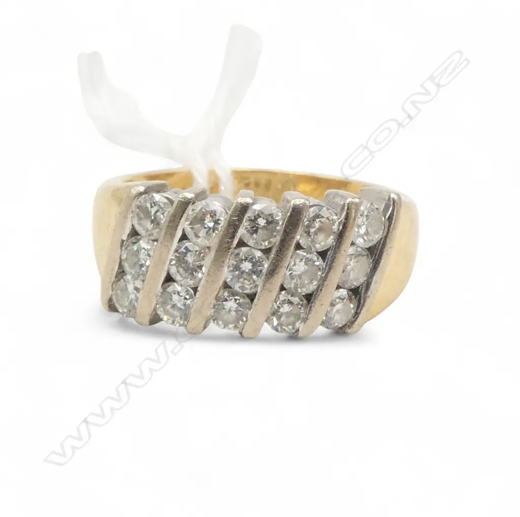 18CT GOLD AND CHANNEL SET DIAMOND RING 1.00ct total 8.84gms SIZE O Image 1++