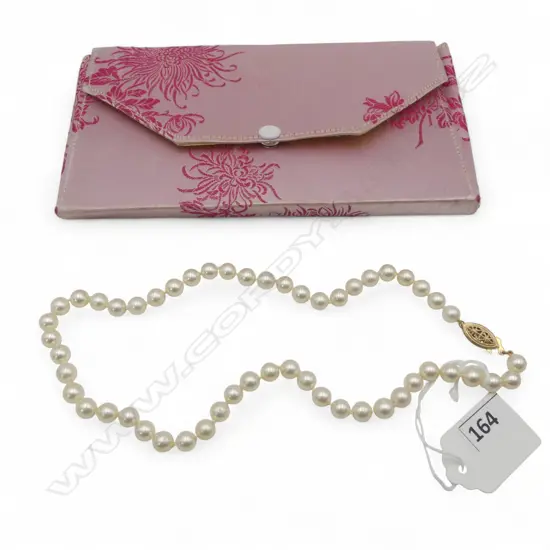 a single strand of 53 Akoya cultured pearls (silver cream tone