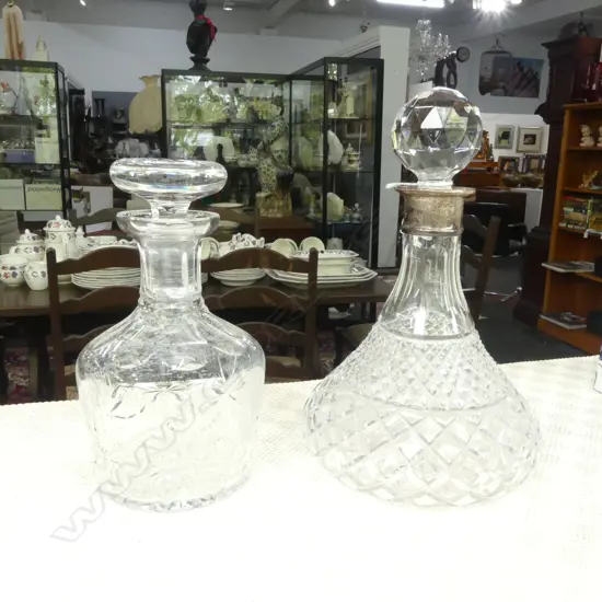 2 CRYSTAL DECANTERS; 1 w. STG SILVER COLLAR H.260mm