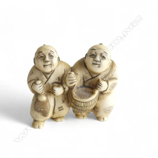 IVORY NETSUKE FIGURE GROUP signed