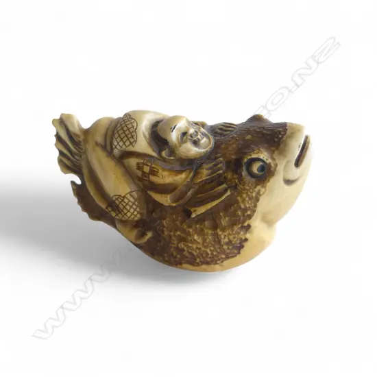 IVORY NETSUKE MAN ON FISH signed