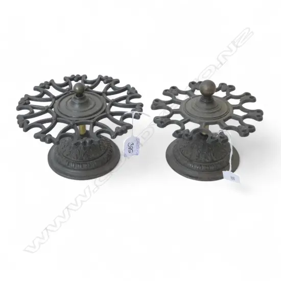 2 OLD Cast Iron Stamp Roll Holders