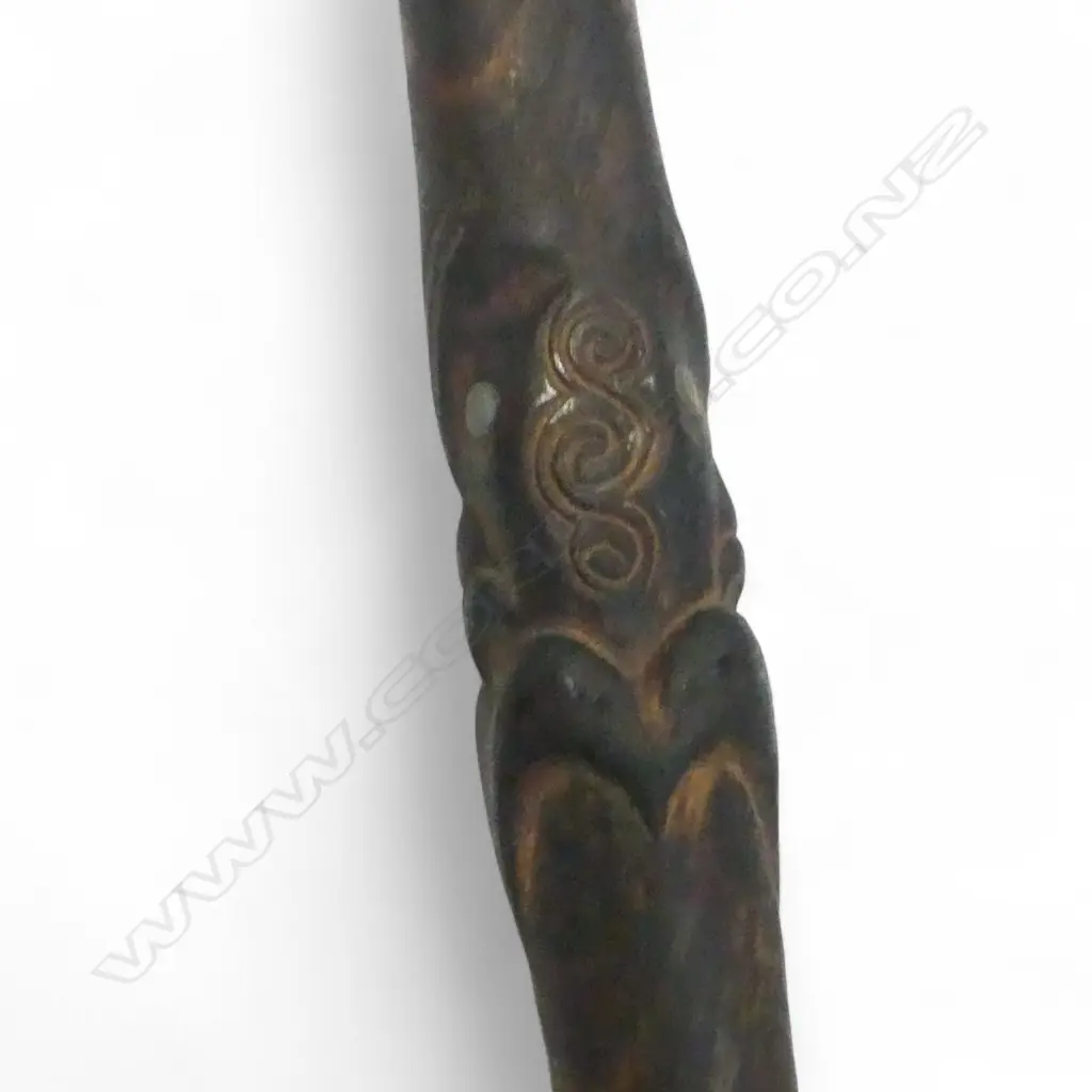 Mid / late 20thC MAORI TEWHATEWHA  w PAUA INLAID AT TOP OF BLADE & CARVED HEAD TO SHAFT.  L.1170mm. Of good weight Image 1++