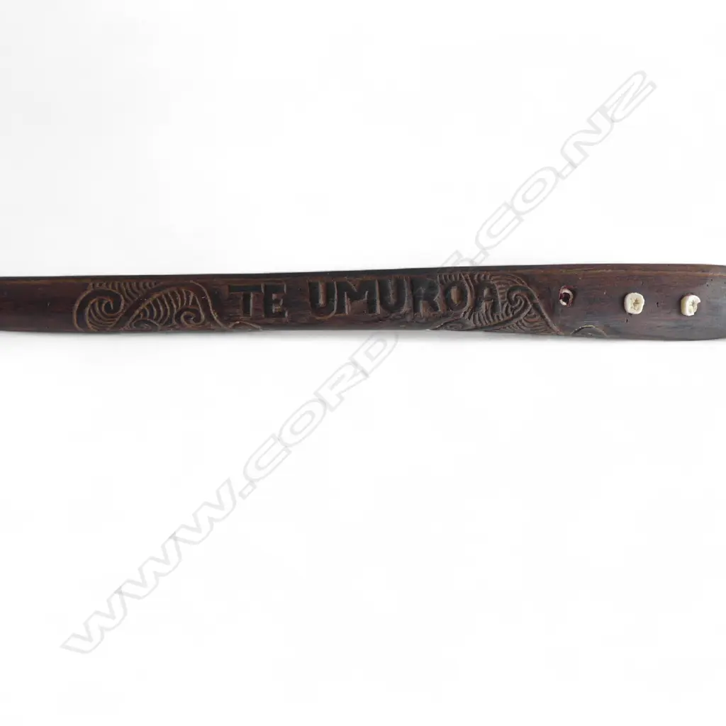 mid / late 20thC MAORI TOKI KAKAUROA  w 19thC TRADE AXE BLADE; CARVED 'TE UMUROA' TO THE SHAFT. L.905mm Image 1++