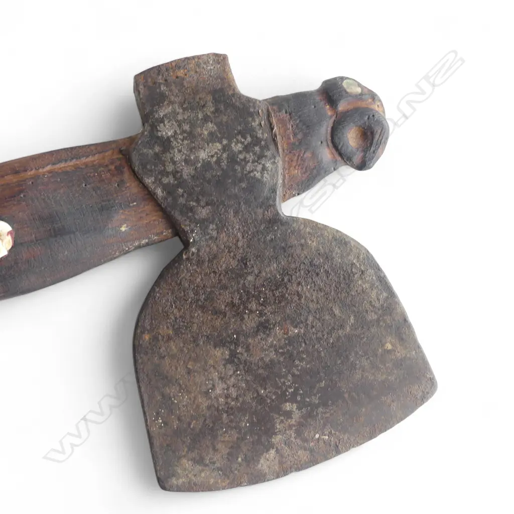 mid / late 20thC MAORI TOKI KAKAUROA  w 19thC TRADE AXE BLADE; CARVED 'TE UMUROA' TO THE SHAFT. L.905mm Image 1++