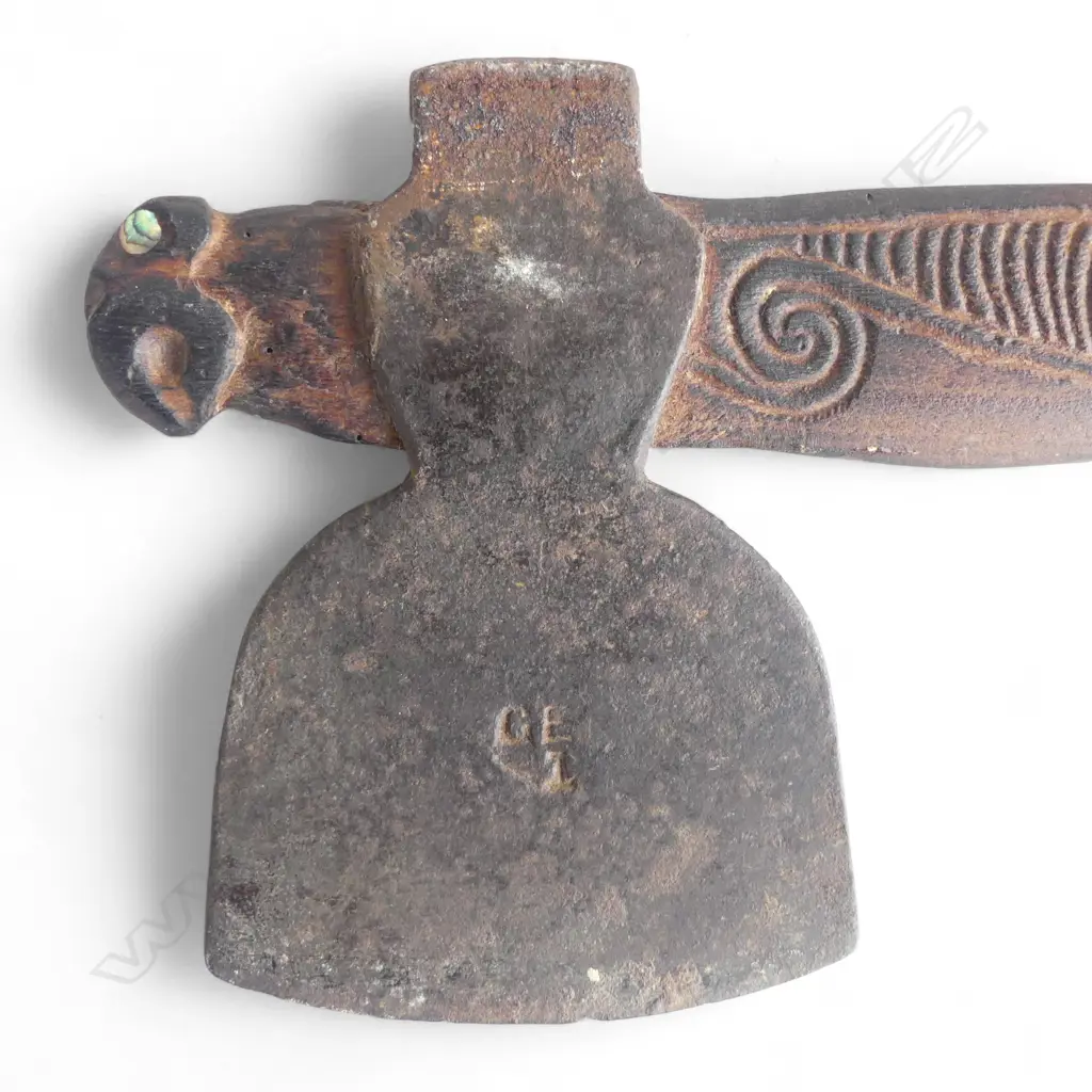 mid / late 20thC MAORI TOKI KAKAUROA  w 19thC TRADE AXE BLADE; CARVED 'TE UMUROA' TO THE SHAFT. L.905mm Image 1++