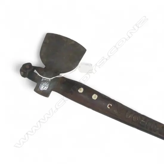 mid / late 20thC MAORI TOKI KAKAUROA  w 19thC TRADE AXE BLADE; CARVED 'TE UMUROA' TO THE SHAFT. L.905mm