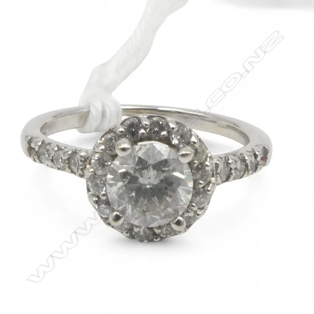 14ct WHITE GOLD DIAMOND HALO RING, 3.35gm, D1ct ? centre with 0.21ct accents size N1/2 Image 1++