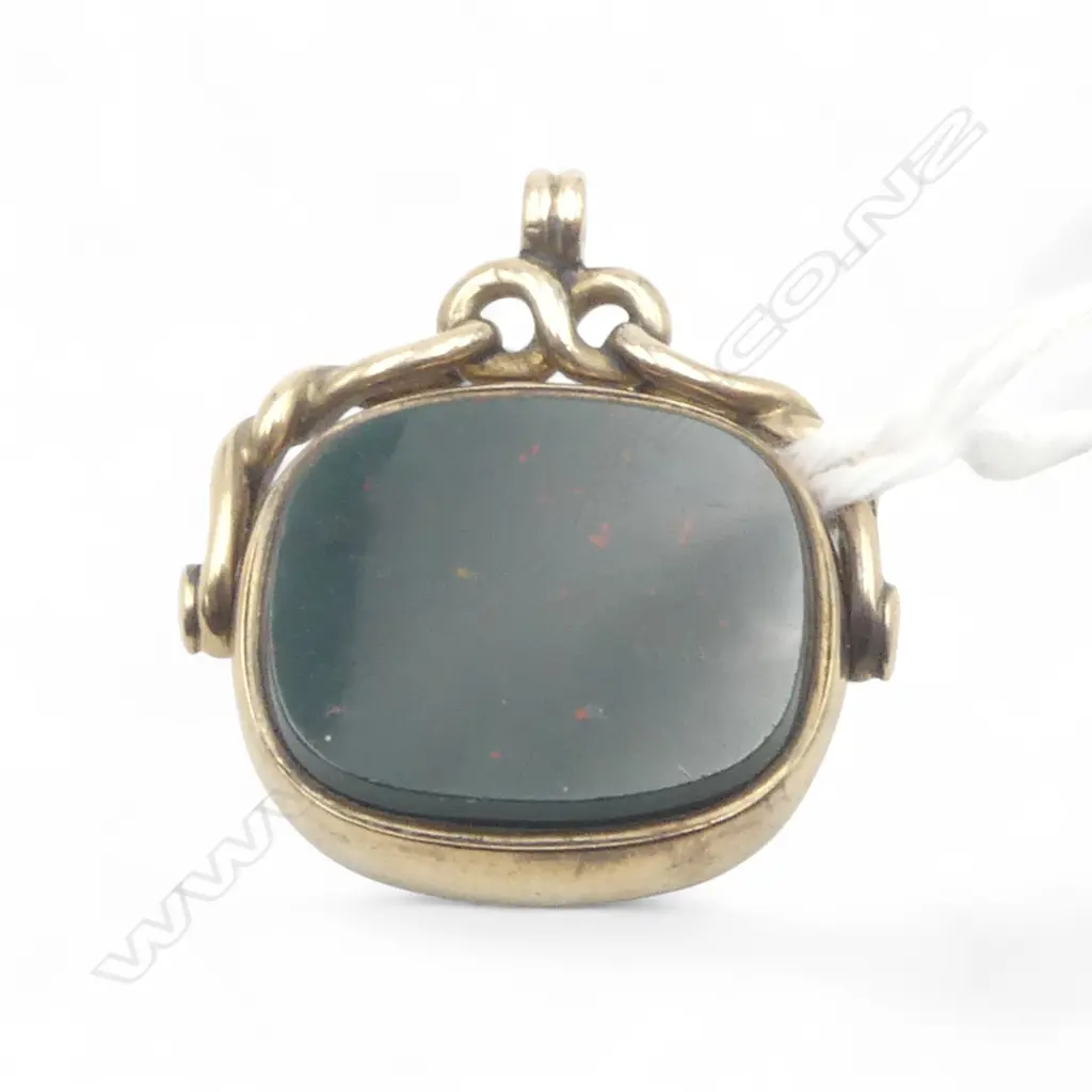 c.1900 9ct SPINNER  bloodstone & carnelian panels. Twisting frame. 6.gms Image 1++