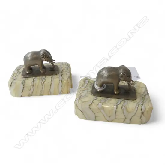 PAIR SMALL SILVER PLATE SCULPTED ELEPHANTS EACH ON ELEPHANT MOLAR SLAB BASE. L.65MM