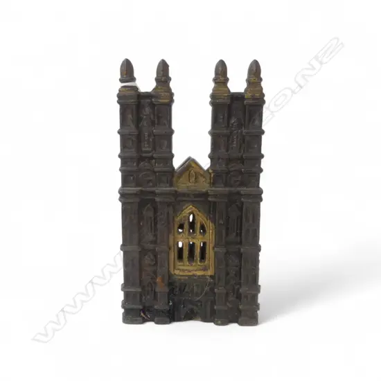 Victorian cast iron still money bank as Westminster Abbey. Original gilding. H.160mm.