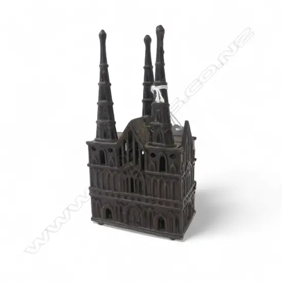 Victorian cast iron still money bank as Lichfield Cathedral. Original bronzed finish. H.160mm.