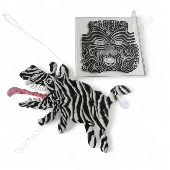 TWO DECORATIVE PERSPEX PANELS, ONE PAINTED AND ETCHED DESIGN OF A MAORI FULL FACE MOKO AND ONE PANTING DOG