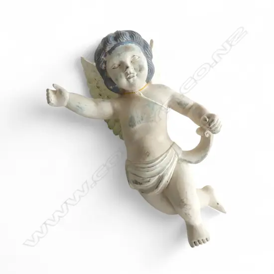 A SCULPTURAL CARVED AND PAINTED WOODEN WINGED CHERUB WALL HANGING 400mm (h)