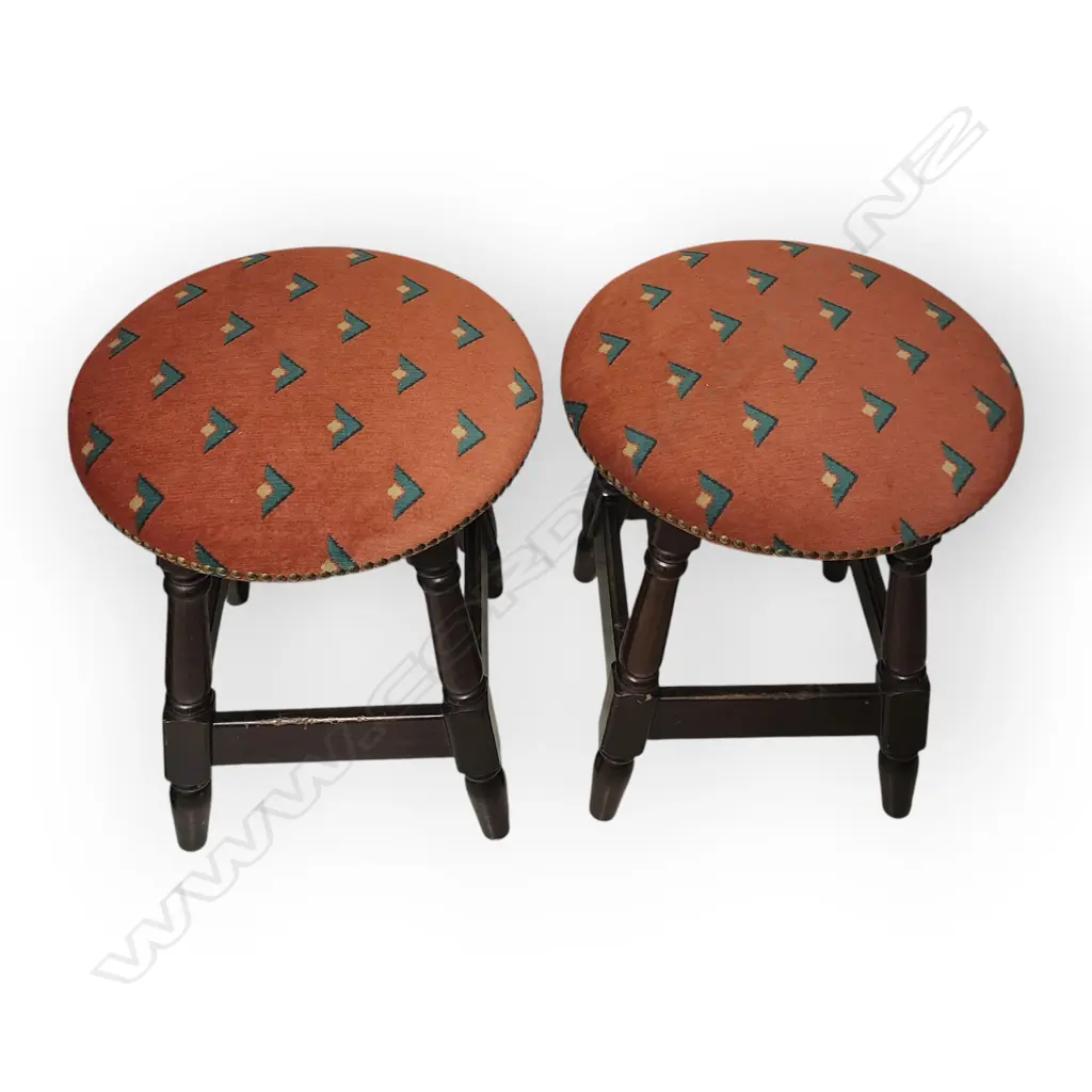 HEAVY PAIR OF VINTAGE WOODEN STOOLS – DARK WOOD WITH RED UPHOLSTERED SEATS AND STUDDED TRIM. Image 1++