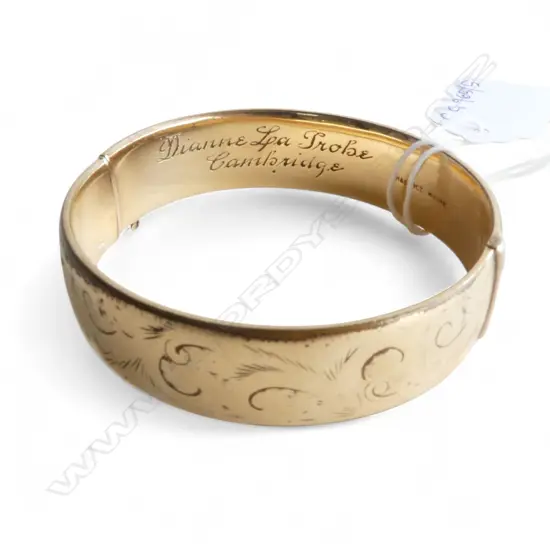 9CT GOLD 'METAL CORE' HINGED BANGLE 29gms