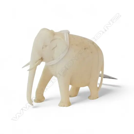 SMALL CARVED IVORY ELEPHANT H.40mm