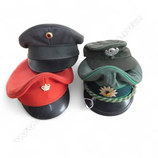 COLLECTION OF 4 PEAKED MILITARY CAPS VARIOUS ARMIES