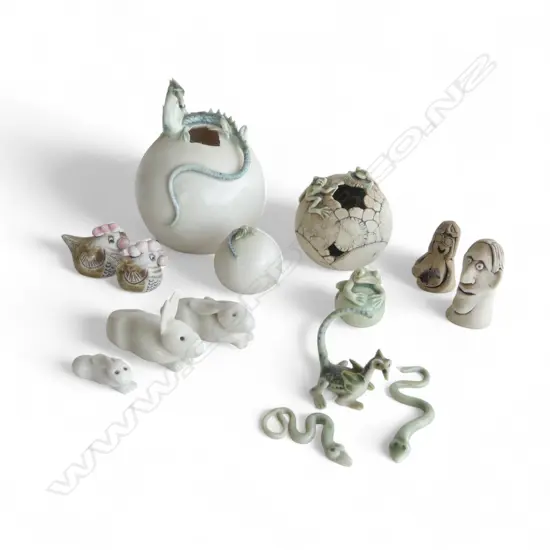 A GROUP OF 14 CERAMIC ANIMAL FIGURINES BY VARIOUS MAKERS INCL FROGS DRAGONS HENS SNAKES AND RABBITS