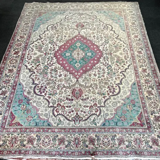 Very large Iranian hand knotted carpet w curvilinear designs & pale tones. 4000 x 3000mm. Faded & some insect damage