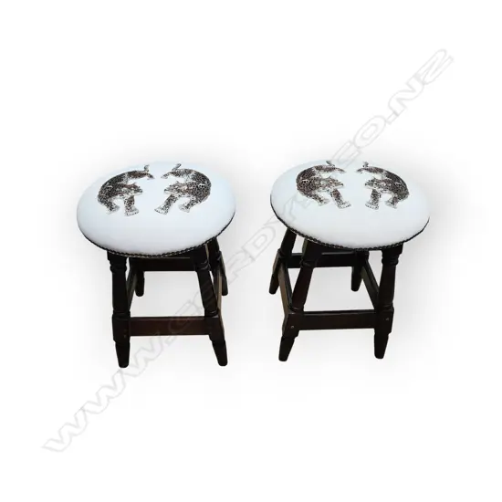 HEAVY PAIR OF VINTAGE WOODEN STOOLS – DARK WOOD UPHOLSTERED SEATS AND STUDDED TRIM.
