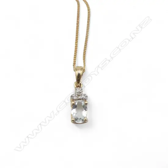 9ct AQUAMARINE & DIAMOND PENDANT ON 9ct GOLD CHAIN L.460mm 1.2gms