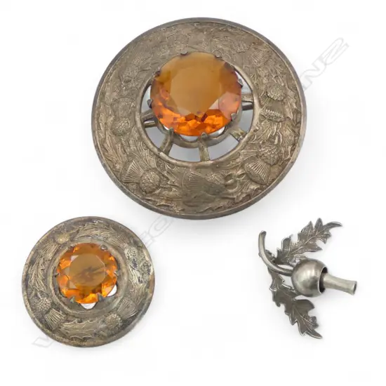 3 SCOTTISH BROOCHES. Largest Dia.83mm - ONE STONE MISSING FROM THISTLE