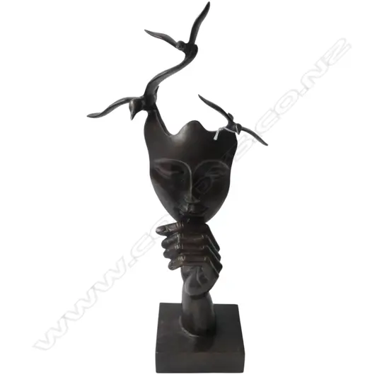 BRONZED BRASS SCULPTURE; FACE HELD BY HAND w. BIRDS ABOVE H.470mm