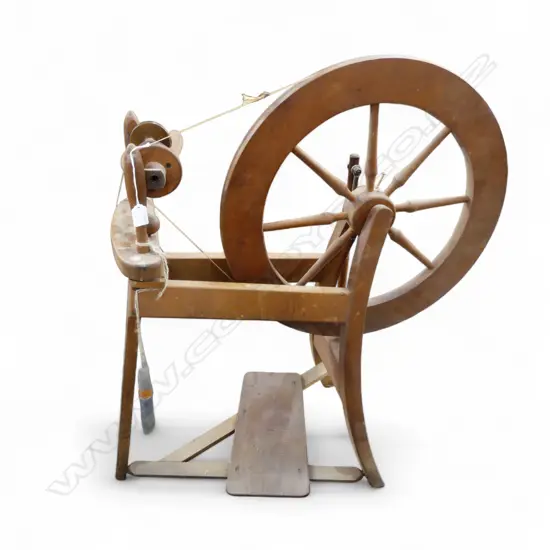WOODEN SPINNING WHEEL Provenance: Ex. the collection of a titled Auckland Lady.