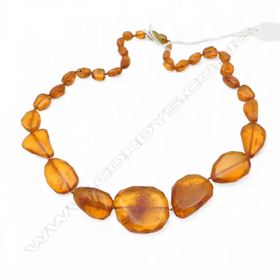 GRADUATED VARIABLE partially facetted AMBER BEAD NECKLACE L.440mm. 