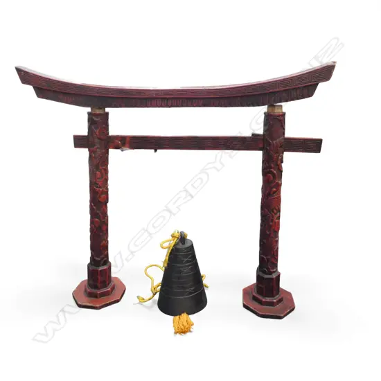 An early 20thC Chinese bronze bell on red lacquer stand -  the temple arch form stand with craved dragon design. The bell with restrained lineal and X decoration. 750 x 600mm, Provenance: Richard Rice estate collection. Purchased Portobello Road London 9/7/1999.