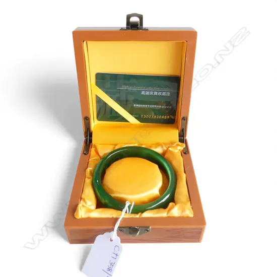 CHINESE FAUX JADE BANGLE, BOXED 60mm int. dia.