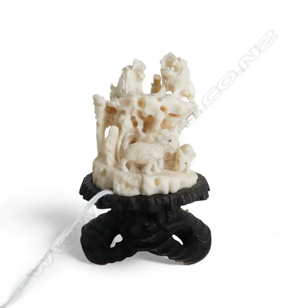 ORIENTAL BONE ORNAMENT ON WOODEN STAND caved and pierced animal design H.80mm Image 1++