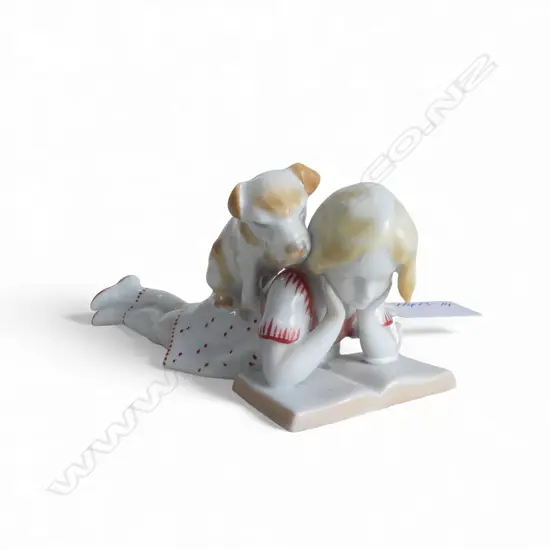 1960's Kunstporzellan porcelain girl reading with dog to her back L.125mm