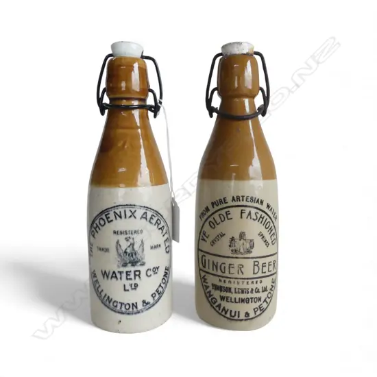 2 VINTAGE N.Z. STONEWARE BOTTLES; 'YE OLDE FASHIONED GINGER BEER' + 'PHOENIX AERATED WATER' H.220mm