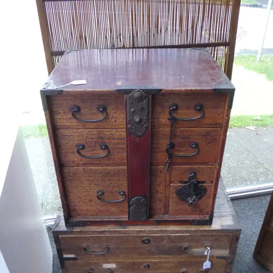 Vintage small Japanese collector's chest. Red lacquer/stained finish with locking bar & keys. H.450mm