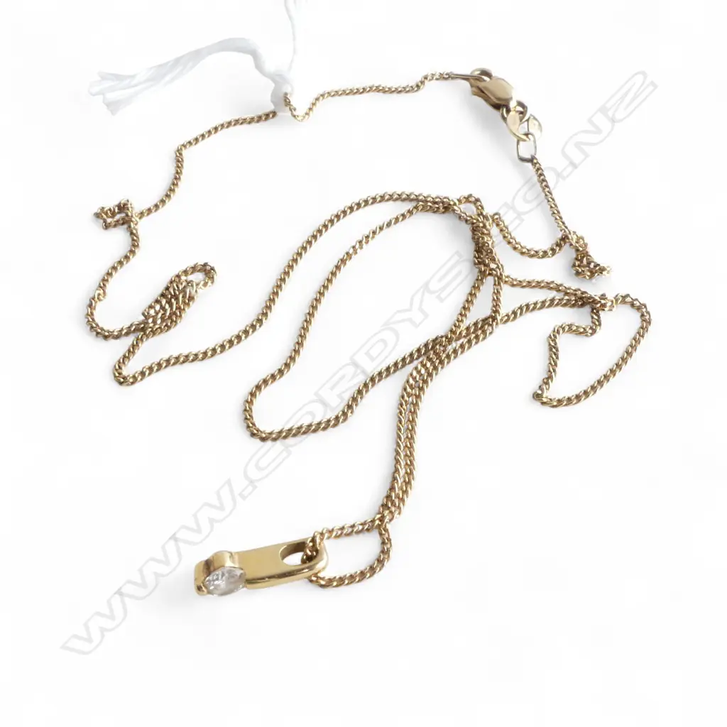 9CT GOLD NECKLACE (1.6gms) W. 18CT DIAMOND PENDANT (0.48gms) Image 1++