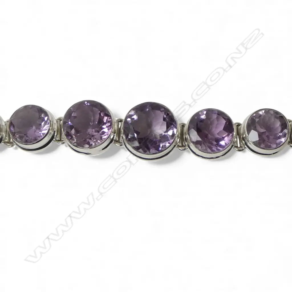 SILVER & AMETHYST BRACELET; STONES ARE GRADUATED Image 1++