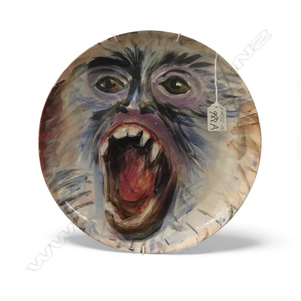 MARK RAYNER (Whanganui) ceramic hand painted plate Monkey with open mouth Dia.285mm. Initialled & dated '09 Image 1++