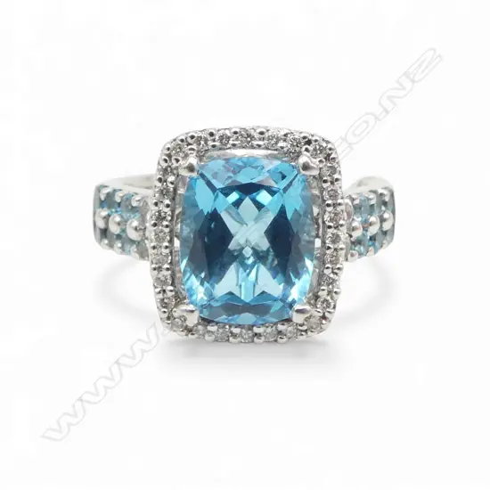 14ct W/GOLD BLUE TOPAZ HALO RING, 5.96gm, valuation SIZE N