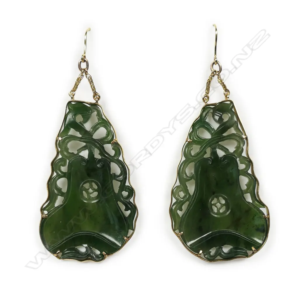 A pair of vintage 18ct yellow gold framed and large carved dark jade earrings, Image 1++