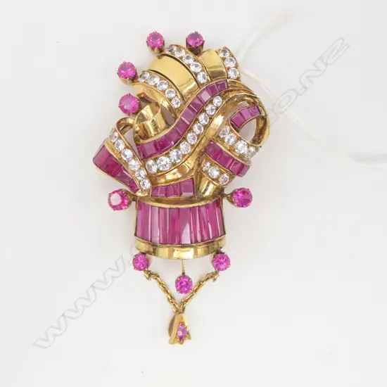 9CT GOLD SYNTHETIC RUBIES AND WHITE SPINELS PENDANT/BROOCH with valuation for $10,000