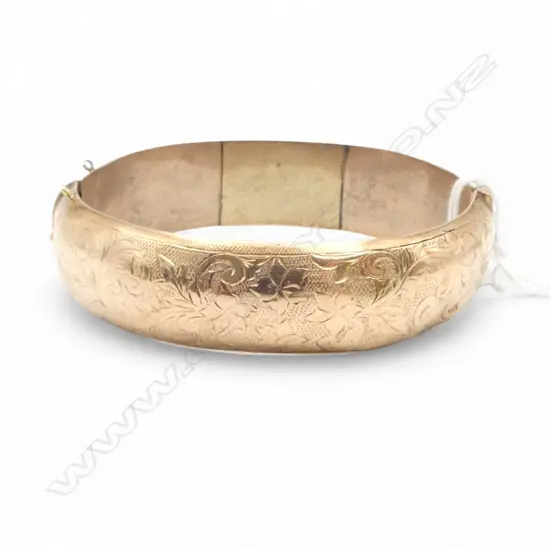 9ct GOLD HINGED BANGLE with faults & repair. 31gms.