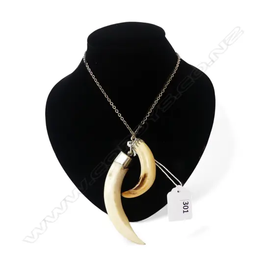 2 David Tuart silver mounted pendants. 1 tusk + 1 tooth? L's.85 & 55mm.....