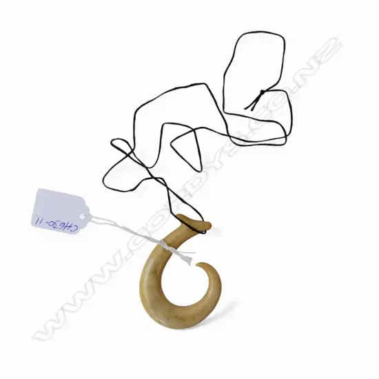 DAVID TUART CARVED WHALE BONE HEI MATAU pendant of good form & polish. 70 x 50mm Note: David Tuart (1936-2019)