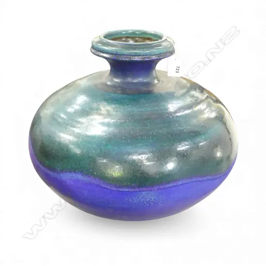 Graeme Storm large squat spherical stoneware vase - c.1970/80's, green over blue/mauve glaze with wavy glaze intersection. Impressed potters mark. H.330mm.