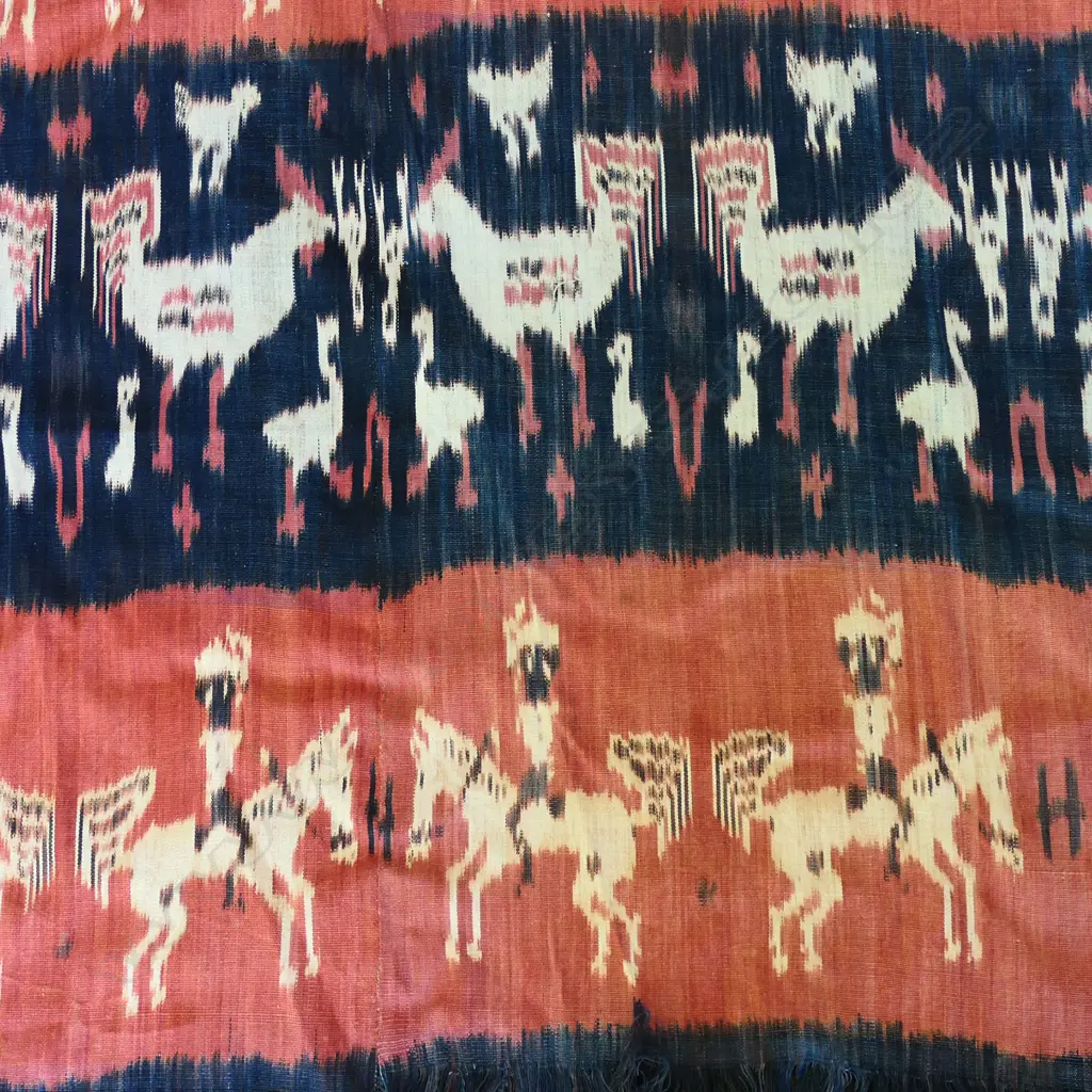 20thC INDONESIAN IKAT FABRIC, FIGURES ON HORSES & CHICKEN MOTIFS, BANDS OF RED & INDIGO, 2030 x 1090mm Image 1++